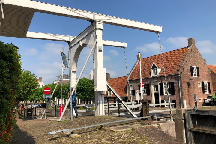 a group of people in front of a building