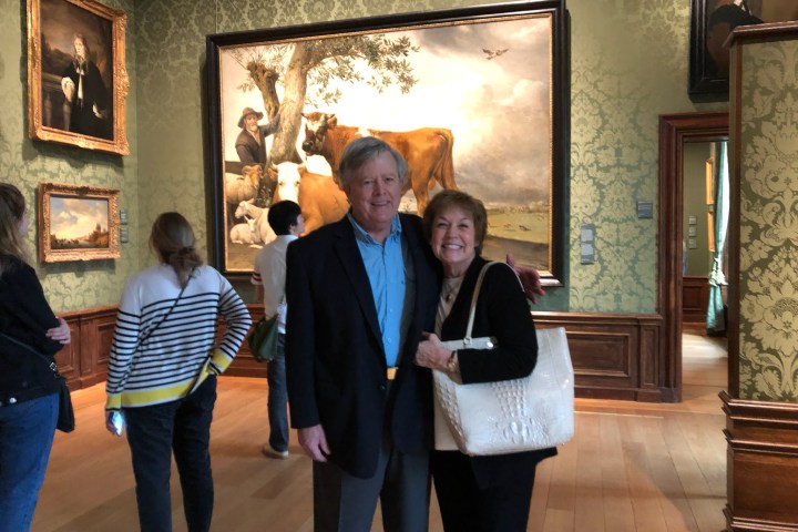 a group of people standing in a room