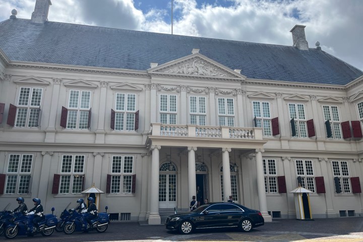 a car parked in front of a building