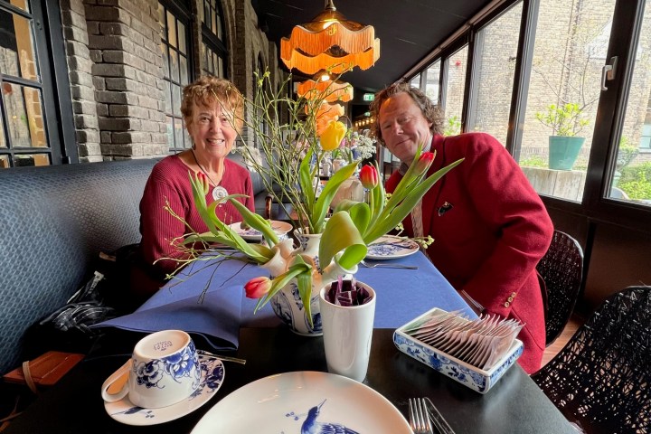 a group of people sitting at a table