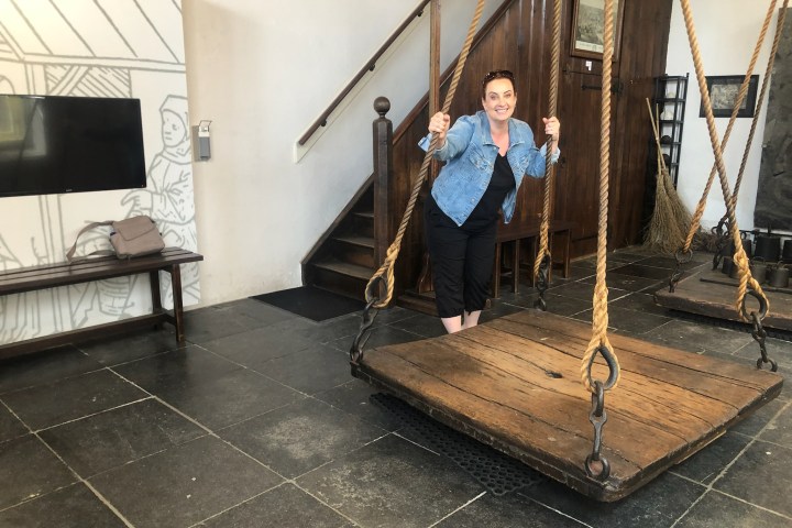 a person standing in front of a building