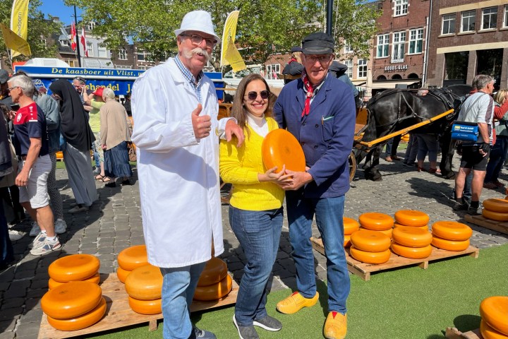 a group of people standing in front of a crowd