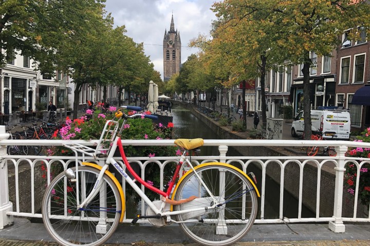 a bicycle parked in front of a building