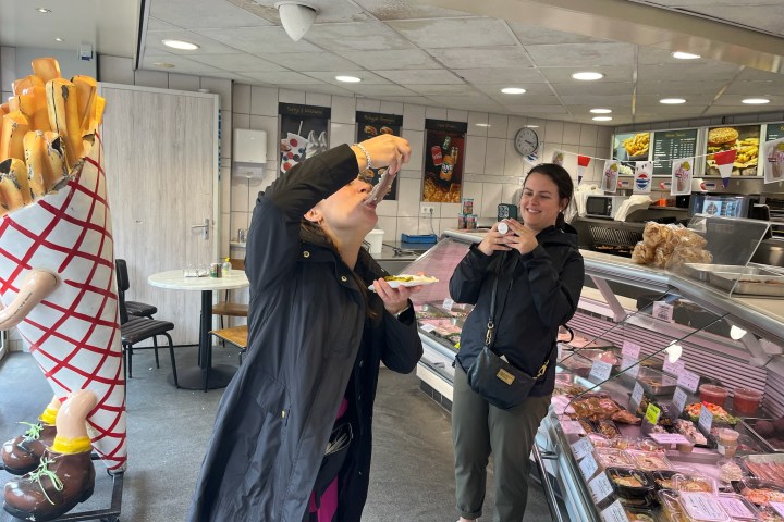 a group of people standing in a room