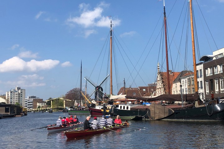 a small boat in a large body of water
